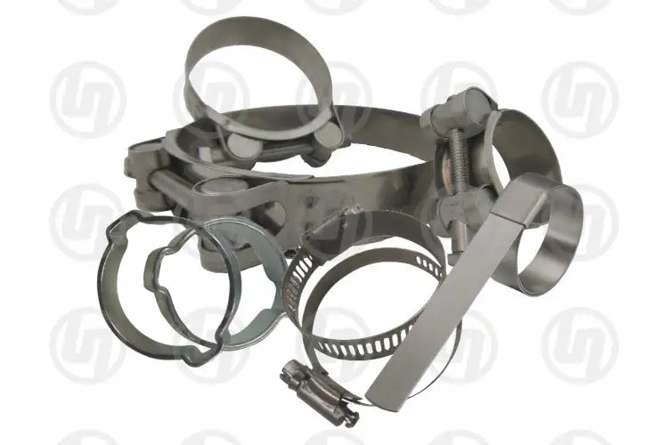 A collection of hose clamps of various sizes in a scattered layout